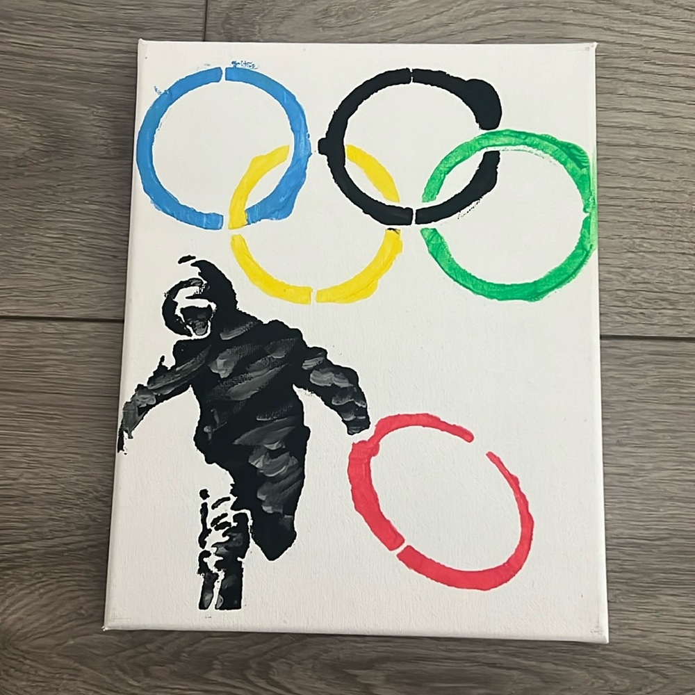 Banksy “Olympic Rings”